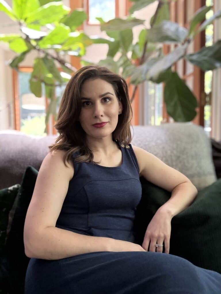 Aubrey Bodt, therapist for women and mothers in Maryland, sitting in a calm office setting